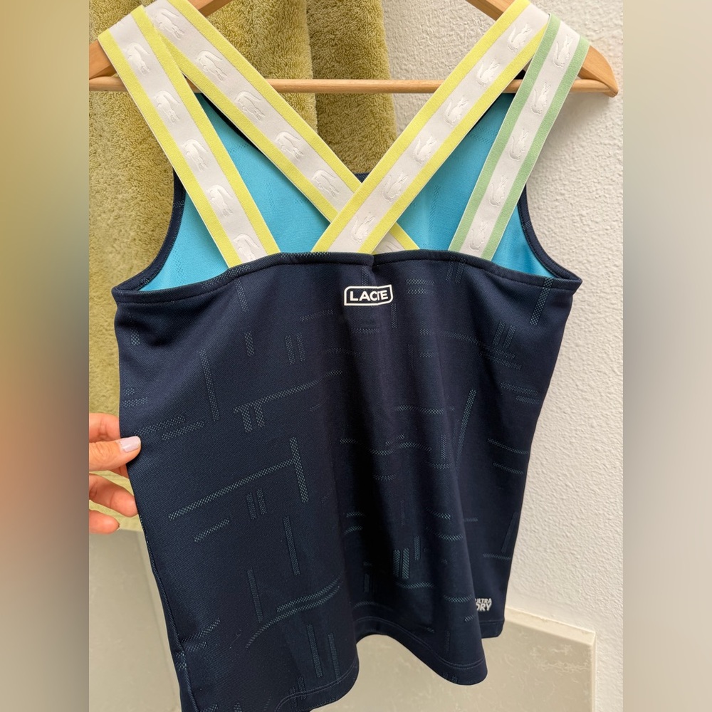Lacoste Navy Tank tennis top with Turquoise Lining and Yellow-Trim Straps.